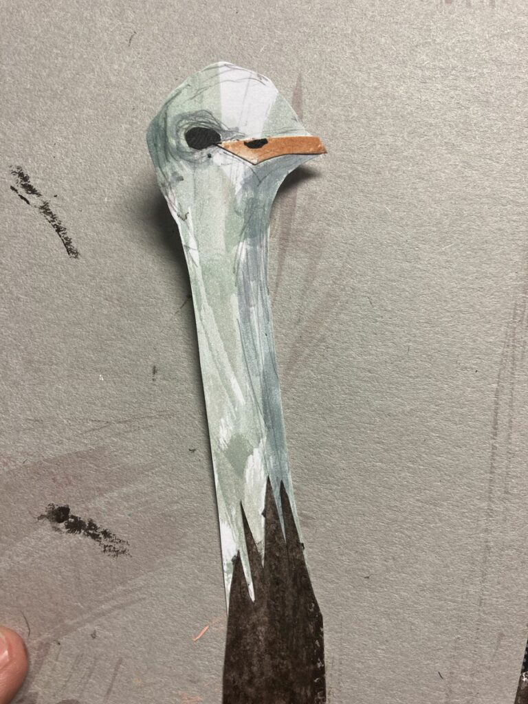 first ostrich paper cut out close up