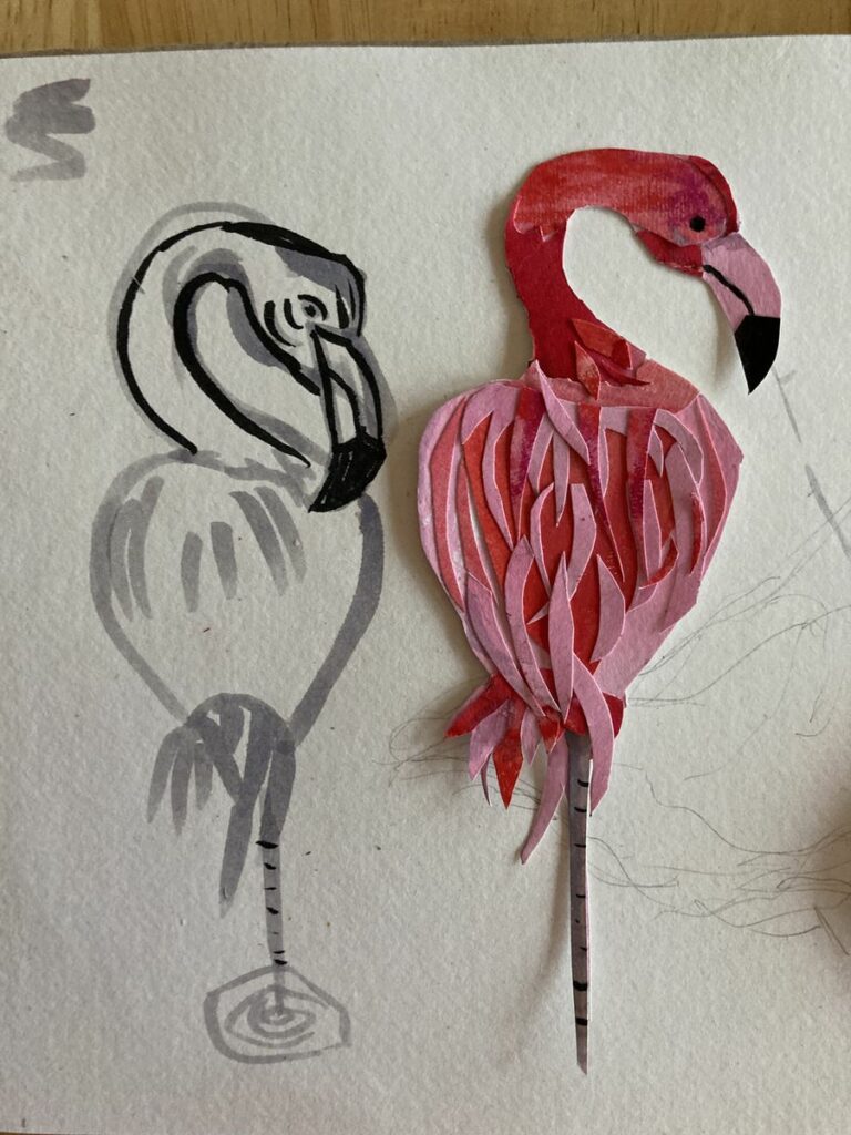 Flamingo paper cut out next to original drawing