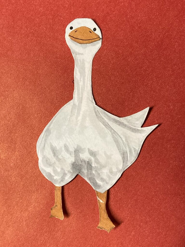 goose illustration out of cut paper on red background